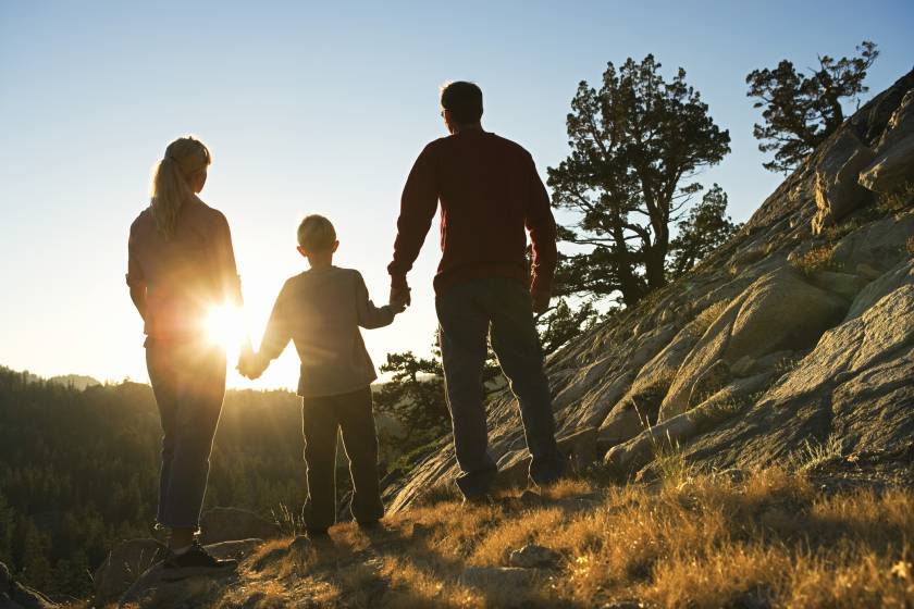 family hiking in truckee enjoying sunset view